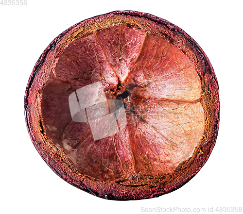 Image of Dark purple mangosteen shell top view isolated on white