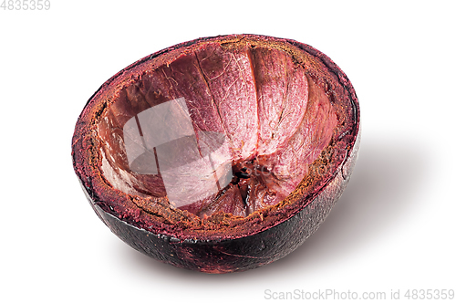 Image of Dark purple mangosteen shell isolated on white