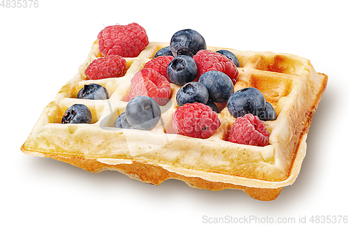 Image of French waffle with berries isolated on white