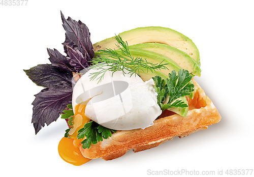 Image of French waffle with poached egg and avocado