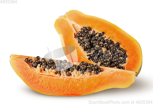 Image of Half and quarter ripe papaya isolated on white