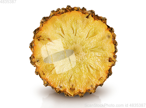 Image of Half of pineapple slice side view isolated on white