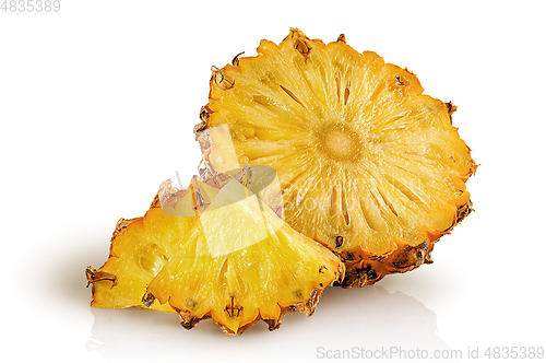 Image of Half pineapple and slices isolated on white