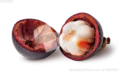 Image of Opened mangosteen and shells near isolated on white