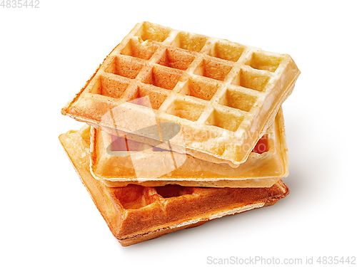 Image of Three crispy fried french waffles isolated on white