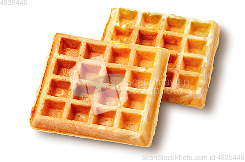 Image of Two crispy fried french waffles isolated on white