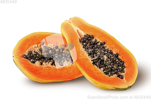 Image of Two half ripe papaya one after another