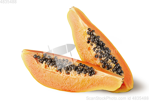 Image of Two quarters of ripe papaya one after another