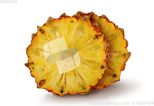 Image of Two slices of pineapple each other isolated on white