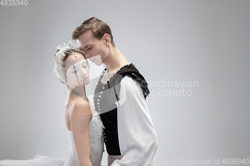 Image of Young graceful couple of ballet dancers on white studio background