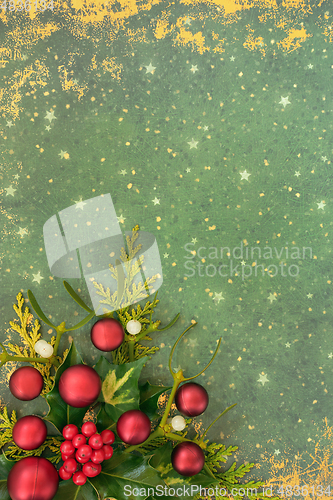 Image of Christmas Background with Winter Greenery and Red Baubles
