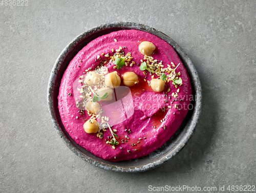 Image of plate of beetroot hummus