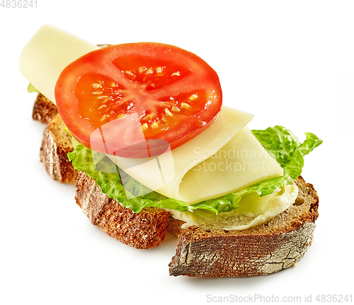 Image of sandwich with cheese and tomato