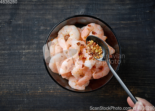 Image of bowl of prawns and chili flakes