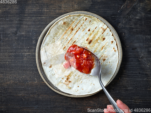 Image of process of making tacos