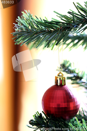Image of Christmas ornaments on tree.