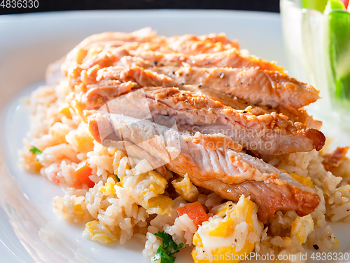 Image of Roasted chicken breast on fried rice