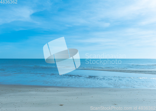 Image of Grey beach and blue sea