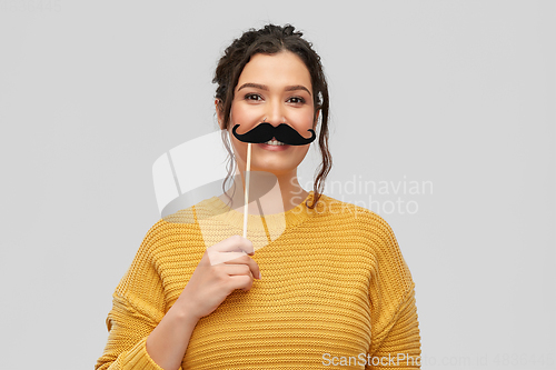 Image of happy woman with vintage moustaches