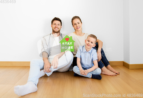 Image of happy family staying at home during quarantine