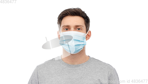 Image of portrait of young man in protective medical mask