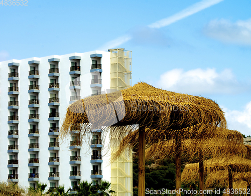 Image of Thatched Umbrellas in Resort