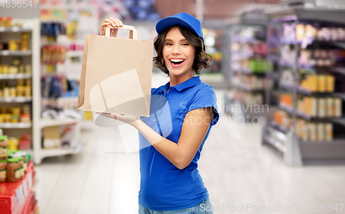 Image of delivery woman with takeaway food in paper bag