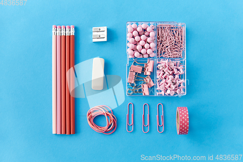 Image of pencils, pins, clips, eraser, sharpener and rubber