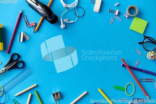 Image of stationery or school supplies on blue background