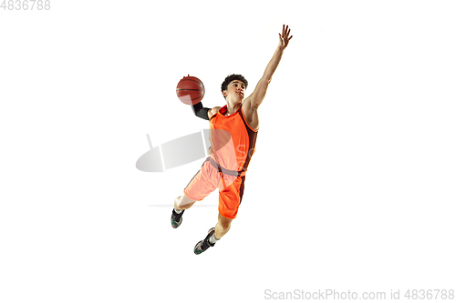 Image of Young basketball player training isolated on white studio background