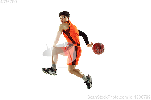 Image of Young basketball player training isolated on white studio background