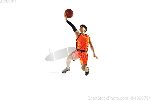 Image of Young basketball player training isolated on white studio background