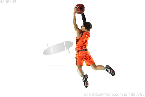 Image of Young basketball player training isolated on white studio background