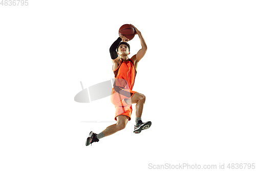 Image of Young basketball player training isolated on white studio background