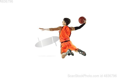 Image of Young basketball player training isolated on white studio background