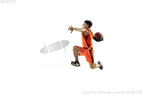 Image of Young basketball player training isolated on white studio background