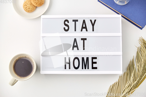 Image of lightbox with stay at home caution words