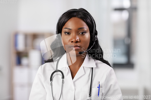 Image of african american doctor with headset at hospital