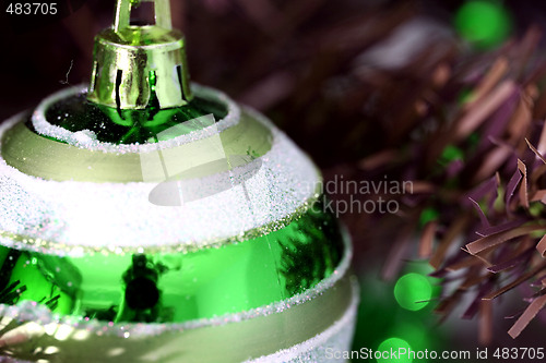 Image of Christmas ornaments on tree.