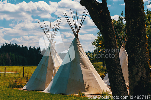 Image of teepee conical tent made from animal skins