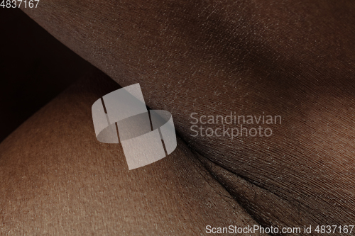 Image of Texture of human skin. Close up of african-american male body