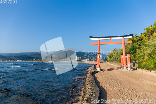 Image of Red torii in Aoshima Shrine with blue sky