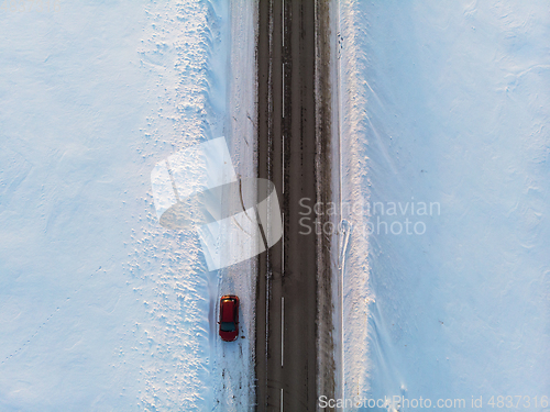 Image of Aerial view of a road in winter landscape