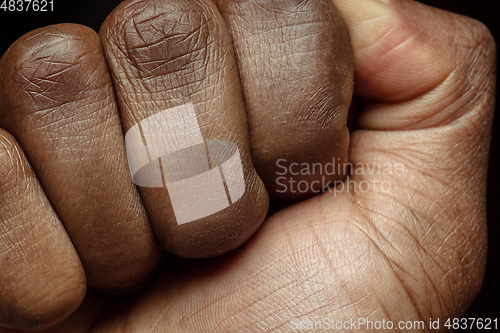 Image of Texture of human skin. Close up of african-american male body