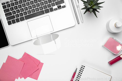 Image of Flat lay, mock-up. Feminine home office workspace, copyspace