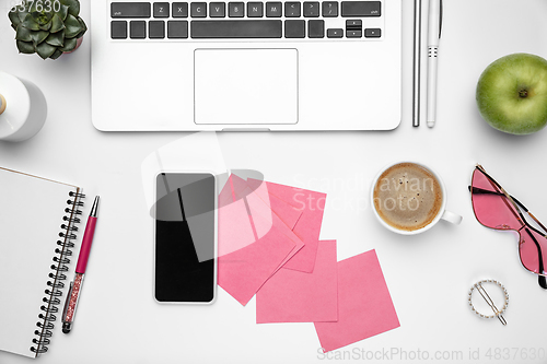 Image of Flat lay, mock-up. Feminine home office workspace, copyspace