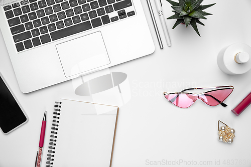 Image of Flat lay, mock-up. Feminine home office workspace, copyspace