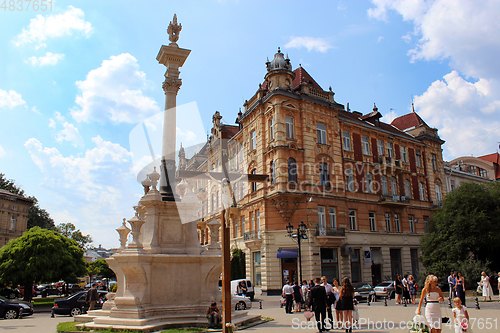 Image of street in Lviv with monument