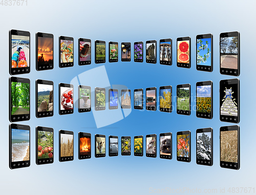 Image of Modern mobile phones with different images