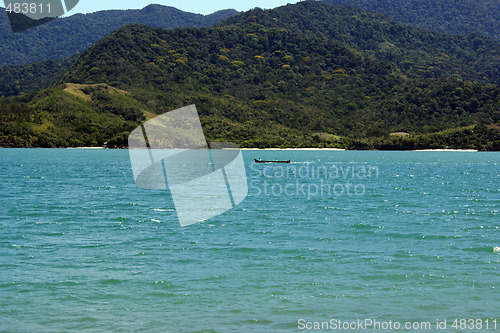 Image of Beautiful view of the sea, mountains and a lone boat